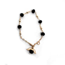 Pulsera de cristal cortado negro, con El Espíritu Santo - Librería y Artículos Religiosos San Judas Tadeo